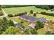 Aerial view showing a large brick building and surrounding landscape at 1318 Ostwalt Amity Rd, Cleveland, NC 27013