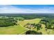 Aerial view of property showing its location in a rural setting at 1318 Ostwalt Amity Rd, Cleveland, NC 27013