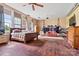Bedroom with wooden bed frame and ample closet space at 1318 Ostwalt Amity Rd, Cleveland, NC 27013