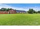 Brick building with large windows and grassy area at 1318 Ostwalt Amity Rd, Cleveland, NC 27013