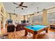 Game room with pool table, couches, and exercise equipment at 1318 Ostwalt Amity Rd, Cleveland, NC 27013