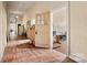 Long hallway with multiple doors and hardwood floors at 1318 Ostwalt Amity Rd, Cleveland, NC 27013
