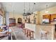Large kitchen with island, wooden cabinets, and hardwood floors at 1318 Ostwalt Amity Rd, Cleveland, NC 27013