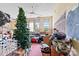 Large room with a Christmas tree and various items at 1318 Ostwalt Amity Rd, Cleveland, NC 27013