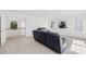 Bright living room overlooking the foyer featuring neutral carpet and paint at 14500 Harvington Dr, Huntersville, NC 28078