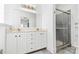 Modern bathroom with double vanity and glass shower at 150 Heathrow Ln, Statesville, NC 28677