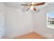Image of a clean, well-lit bedroom with neutral walls and trim at 16812 Lookout Landing Ln, Charlotte, NC 28278