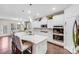 Modern kitchen featuring white cabinets, stainless steel appliances, and quartz countertops at 16812 Lookout Landing Ln, Charlotte, NC 28278