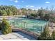 Aerial view of the fenced in multi-sport court with basketball hoop at 16812 Lookout Landing Ln, Charlotte, NC 28278