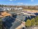Aerial view of the well-maintained tennis courts in a desirable community at 16812 Lookout Landing Ln, Charlotte, NC 28278