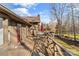 Wide back deck with seating and red umbrella provides a great space for outdoor living and entertaining at 1703 Fairway Dr, Newton, NC 28658