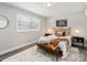 Cozy bedroom with a queen bed and neutral decor at 2000 Patio Ct # 108, Charlotte, NC 28205