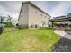 House exterior showcasing backyard, patio, and landscaping at 2122 Capricorn Ave, Indian Trail, NC 28079