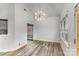 Sunlit dining room with hardwood floors and access to patio at 2134 Pinefield Ct, Gastonia, NC 28056