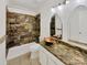 Updated bathroom with copper sink and tile shower at 237 Northwest Dr, Davidson, NC 28036