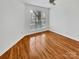 Well lit bedroom with hardwood floors and ceiling fan at 237 Northwest Dr, Davidson, NC 28036