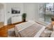 Virtually staged bedroom with hardwood floors at 237 Northwest Dr, Davidson, NC 28036