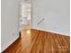 Hardwood floor hallway with view into living area at 237 Northwest Dr, Davidson, NC 28036