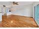 Hardwood floor living room with access to patio and kitchen at 237 Northwest Dr, Davidson, NC 28036