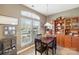 Cozy dining area with built-in hutch and hardwood floors at 3047 Misty Harbor Cir # B, Cramerton, NC 28032