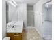 Clean bathroom with double vanity and a shower at 3217 Ian Patrick Ave, Kannapolis, NC 28083