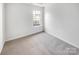 Spacious bedroom with neutral walls and carpet at 3217 Ian Patrick Ave, Kannapolis, NC 28083