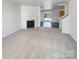 Spacious living area with a fireplace and access to backyard at 3217 Ian Patrick Ave, Kannapolis, NC 28083