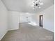 Bright main bedroom with high ceilings and carpet at 3217 Ian Patrick Ave, Kannapolis, NC 28083