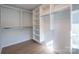 Spacious walk-in closet with ample shelving and hanging space at 339 East Blvd, Charlotte, NC 28203