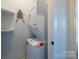 Compact laundry room with stackable washer and dryer at 339 East Blvd, Charlotte, NC 28203