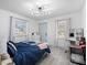 Bright bedroom featuring a modern light fixture and neutral walls and flooring, creating a cozy ambiance at 3411 Rogers St, Charlotte, NC 28208