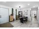 Bright dining area featuring modern lighting, stylish decor, and an open layout perfect for entertaining at 3411 Rogers St, Charlotte, NC 28208