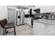 Contemporary kitchen showcasing granite countertops, stainless steel appliances, and ample cabinet space at 3411 Rogers St, Charlotte, NC 28208