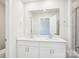 Modern bathroom with double vanity, sleek fixtures, and a large mirror for added convenience at 3500 Backwater St, Concord, NC 28027