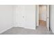 Neutral bedroom with carpet, white walls, and a view of another room at 3500 Backwater St, Concord, NC 28027
