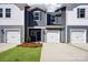 Charming townhouse with a well-manicured lawn, attached garage, and modern siding at 3500 Backwater St, Concord, NC 28027