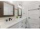 Clean bathroom with double sinks and modern design at 4311 Craig Ave, Charlotte, NC 28211