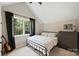Bright bedroom with a king-size bed and ample closet space at 4311 Craig Ave, Charlotte, NC 28211