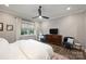 Bright bedroom with a queen-size bed, dresser, and window seat at 4311 Craig Ave, Charlotte, NC 28211