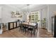 Elegant dining room features a large table and plenty of natural light at 4311 Craig Ave, Charlotte, NC 28211