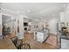 Open concept kitchen with island, and views into living room at 4311 Craig Ave, Charlotte, NC 28211
