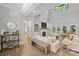 Open living room with hardwood floors, a fireplace, and ample natural light at 4311 Craig Ave, Charlotte, NC 28211