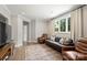 Relaxing living room with comfortable seating and large windows at 4311 Craig Ave, Charlotte, NC 28211