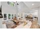 Open concept living room, kitchen, and breakfast bar with stylish decor at 4311 Craig Ave, Charlotte, NC 28211