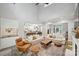 Open living area with a view into the kitchen and access to backyard at 4311 Craig Ave, Charlotte, NC 28211