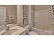 Bathroom with tub/shower combo, vanity, and neutral decor at 4606 Harris Elliot Rd, Lincolnton, NC 28092