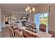 Open dining room with view into living room and backyard access at 4606 Harris Elliot Rd, Lincolnton, NC 28092