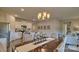 Kitchen with island, stainless steel appliances, and dining area at 4606 Harris Elliot Rd, Lincolnton, NC 28092