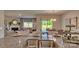 Kitchen island with double sink, overlooking living and dining areas at 4606 Harris Elliot Rd, Lincolnton, NC 28092