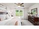 Main bedroom with ceiling fan and large window at 4614 Harris Elliot Rd, Lincolnton, NC 28092